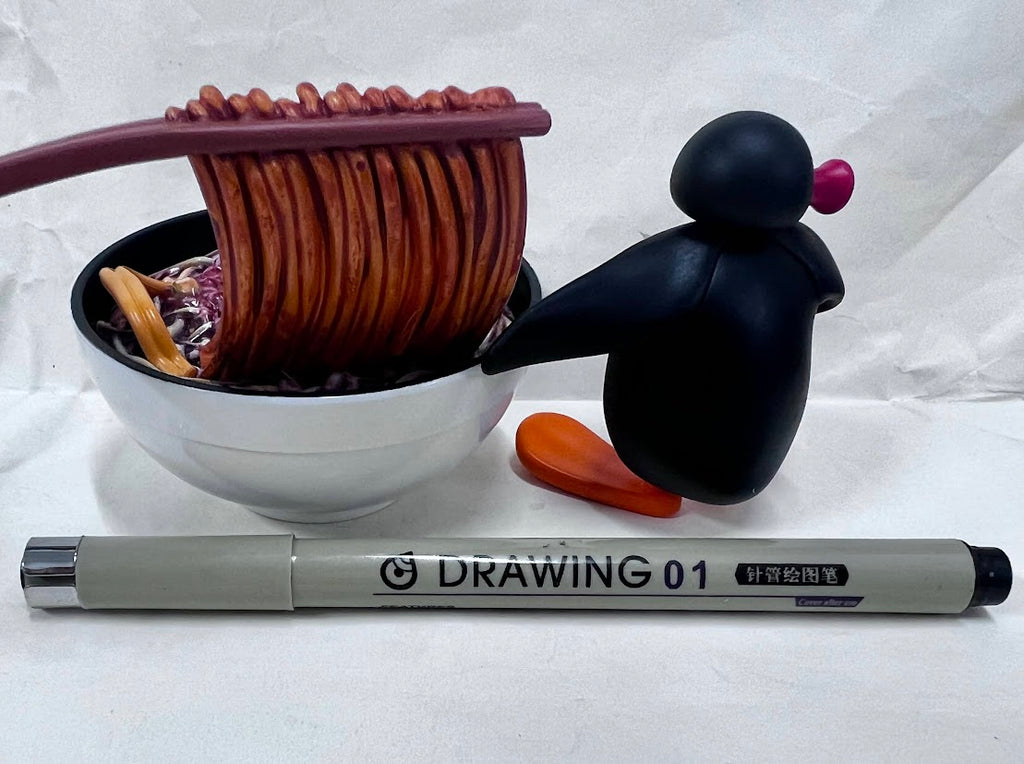 Pygos Pingu action figure Funny Scene - Surfing on noodle