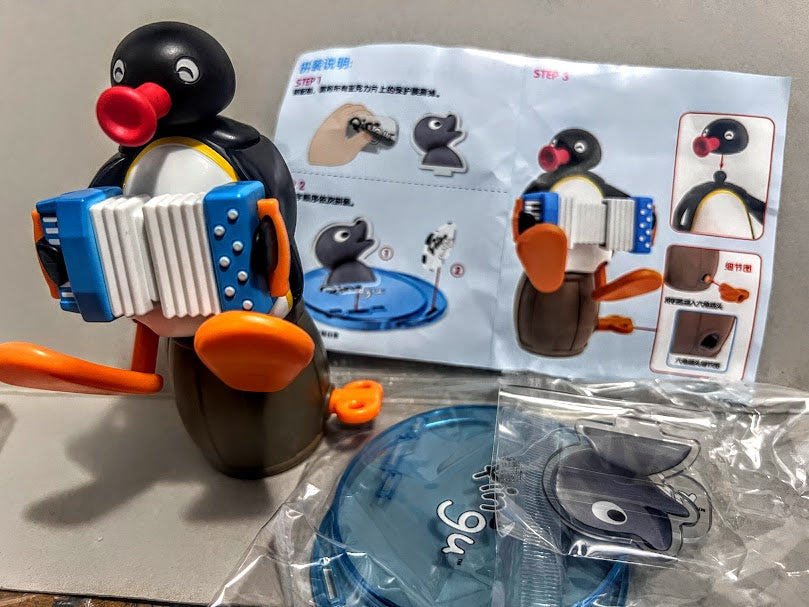Pygos Pingu action figure  - Acordian play 5 inches Wind-up action toy