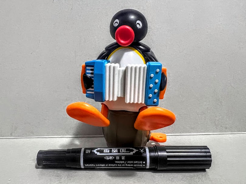Pygos Pingu action figure  - Acordian play 5 inches Wind-up action toy